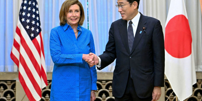 U.S. House of Representatives Speaker Nancy Pelosi shakes hands with Japan's Prime Minister Fumio Kishida before their breakfast meeting at Kishida's residence in Tokyo, Japan August 5, 2022, in this photo released by Kyodo. Mandatory credit Kyodo via REUTERS